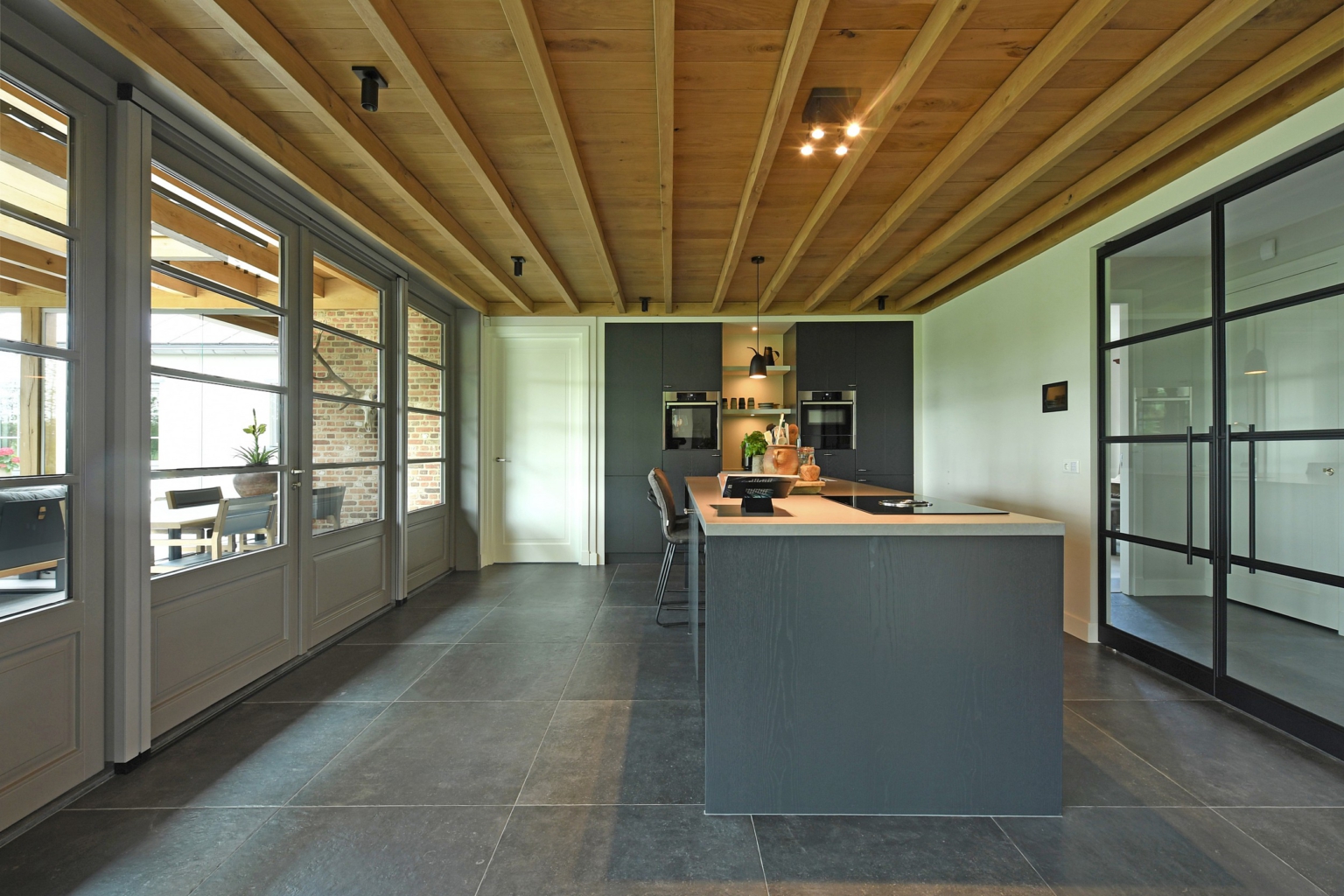 Stunning steel doors in a Kempen-style villa